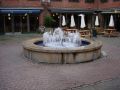 When we went back to the town center, we saw small square with a fountain in the middle.