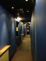 When you enter the club, there's long and narrow corridor painted in blue colour. Still not a sign of a bar.